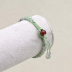 Clarity and Fortune: Rainbow Fluorite Red Agate Woven Boho Bracelet