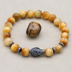 Reichtum und Achtsamkeit Buddha-Armband aus goldenem Tigerauge
