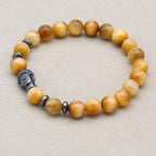 Reichtum und Achtsamkeit Buddha-Armband aus goldenem Tigerauge
