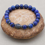 Weisheit und Erdung Perlenarmband mit Buddha-Kopf aus Lapislazuli und Hämatit
