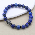 Weisheit und Erdung Perlenarmband mit Buddha-Kopf aus Lapislazuli und Hämatit